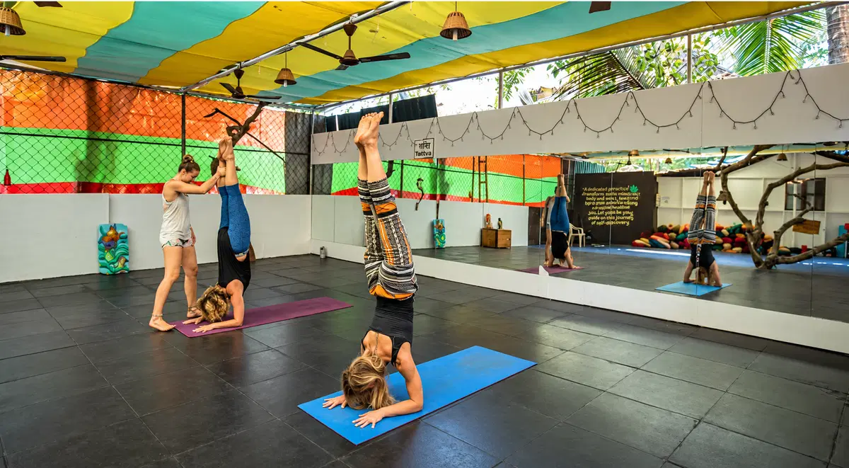 Supported yoga technique practice in the shala