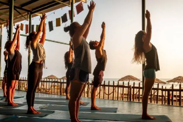 Woman practicing Ashtanga yoga for 200 hours, focusing on strength, flexibility, and mindfulness.